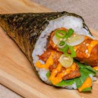 Karaage Hand Roll · 1 piece. Japanese fried chicken, scallion, sesame, mixed greens, and spicy mayo.