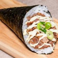 Sukiyaki Beef Hand Roll · 1 piece. Sukiyaki beef, scallions, and mayo sauce.