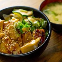 Teriyaki Chicken Don · Chicken thigh in teriyaki sauce, green onion, sesame seed, sancho pepper and mix vegetable. ...