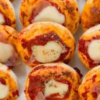Pizzetta · Tomato sauce, mozzarella.