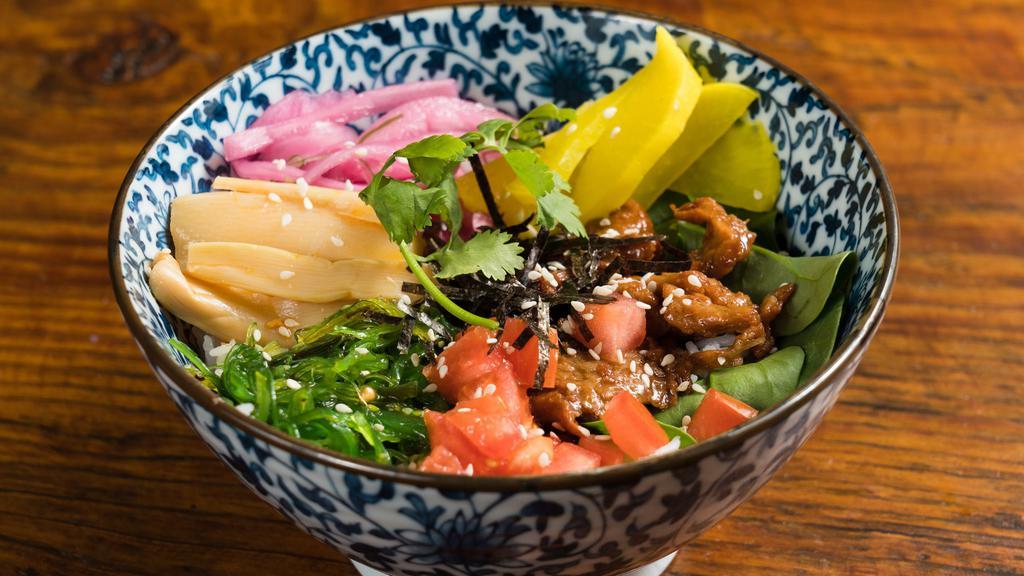 Daily Rice Bowl · Citrus soy, seaweed, pickled onions, and bamboo shoot with tahini dressing.