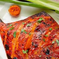 Tandoori Pomfret · Pomfret Fish cooked in Tandoor Oven. - Specialty .