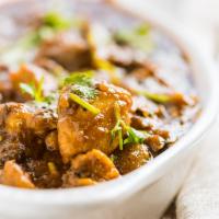 Anjappar Chicken Masala · A bit spicy or spicy. Boneless with chef's curry and cashew.