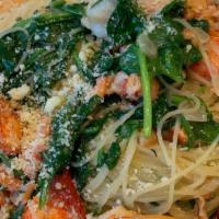 Chopped Lobster Pasta · Angel hair, lobster meat, chopped shrimp, spinach, roasted garlic, chardonnay sauce.