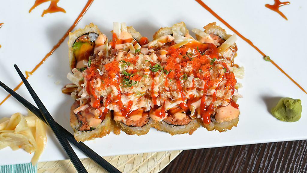Rocky Mountain Roll · Hot and spicy. Spicy tuna, avocado tempura outside top with crab, cucumber, crunch, masago, scallion served with spicy mayo, chili sauce and eel sauce.