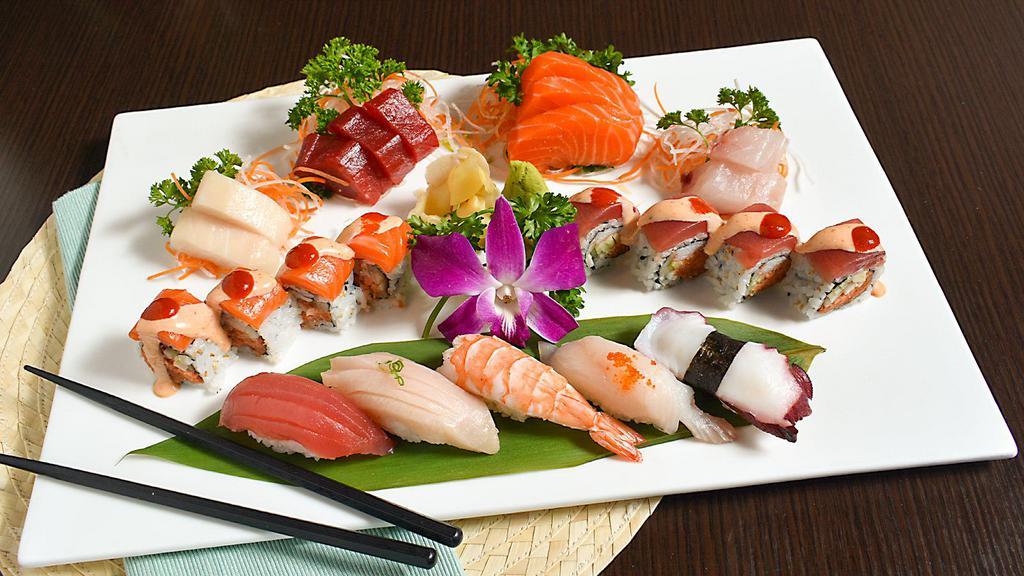 Sushi & Sashimi For One · 10 Pieces of assorted sashimi, five pieces sushi and dancing roll.