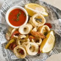 Fried Calamari · Lightly battered calamari served with lemon and marinara sauce.