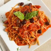 Pasta Alla Puttanesca · Gaeta olives, capers, red onion, olive oil, garlic, and fresh plum tomato.