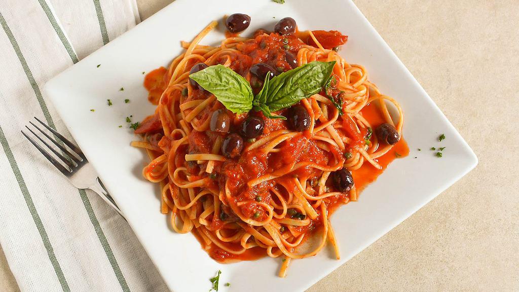 Pasta Alla Puttanesca · Gaeta olives, capers, red onion, olive oil, garlic, and fresh plum tomato.