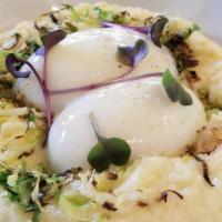 Farm Poached Eggs · Creamy polenta, roasted brussels sprouts, and bacon sauce.