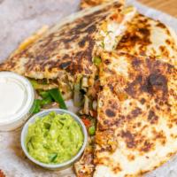 Quesadilla Gringas · Green peppers, onion ,Oaxaca cheese , cheddar cheese pico de gallo.sour crem and guacamole o...