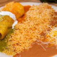 Chimichanga · Deep fried burrito served with your choice of meat and cheese, topped with green and red sal...