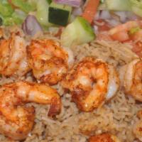 Shrimp Rice Platter · Seasoned basmati rice with large shrimps coated in spices, cooked in light olive oil to perf...