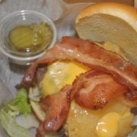 Gourmet Hawaiian Burger · 100% beef, 8oz Burger topped with grilled pineapple, bacon, cheese, lettuce, tomatoes and on...