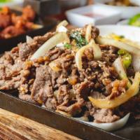 Bulgogi Platter (불고기 프래러) · Korean Bulgogi over Fried Onion.  Rice, Spicy Soy radish and Kimchi. Perfect Dinner Portion ...