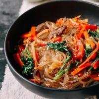 Japchae · Japchae is a savory and slightly sweet dish of stir-fried glass noodles and vegetables that ...