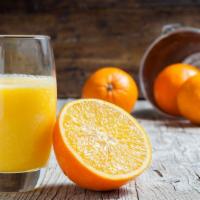 Fresh Squeezed Orange Juice · Fresh squeezed oranges.
