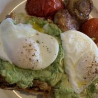Smashed Avocado · Avacodo, poached eggs on multigrain toast w/roasted tomatoes and mushrooms