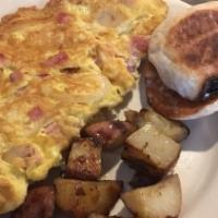 Canadian Omelette · W/Canadian bacon, shallots and Jarlsberg cheese
Served w/ rosemary potatoes and multigrain t...