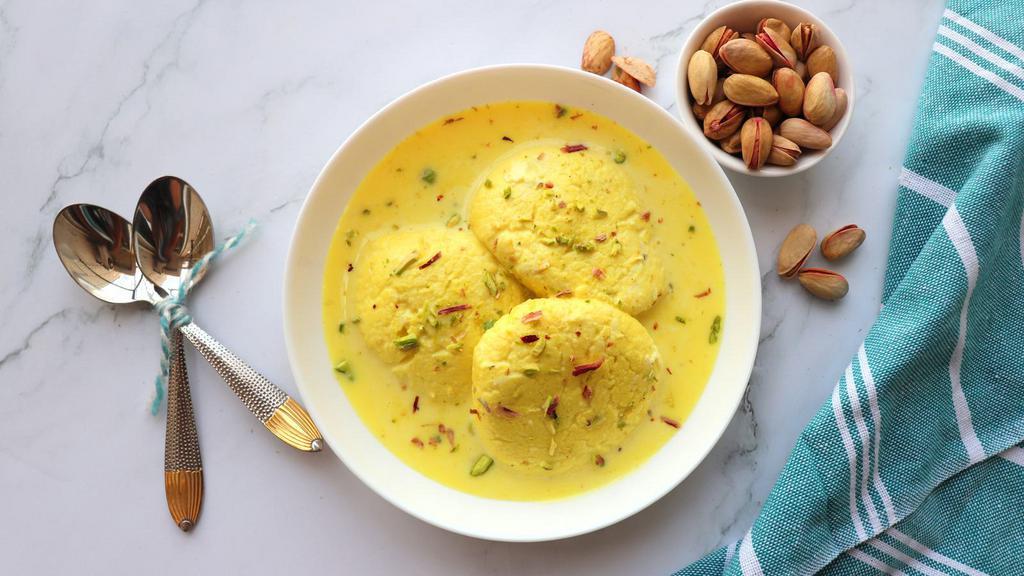 Ras Malai · Fragrant, sweet, paneer dumplings made from made with milk, sugar, and saffron.