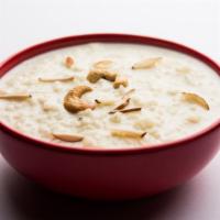 Kheer · Creamy rice pudding flavored with traditional spices.