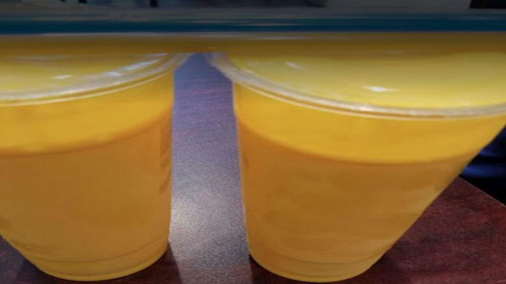 Mango Lassi · Creamy mango and yogurt based drink.
