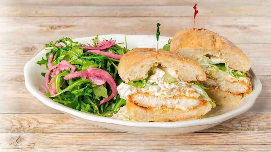 Crispy Fish Sandwich (Lunch) · Breaded cod with romaine, classic coleslaw and homemade tartar sauce on French bread. Served with mixed greens.