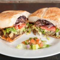 Tortas · Pressed sandwich in a Mexican bread sourced from a local Bushwick panaderia filled with jala...