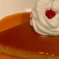 Btc Flan · Homemade flan, condensed and evaporated milk, vanilla and sugar are slowly simmered.