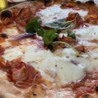 Amatriciana Pizza · San Marzano tomato, mozzarella, pancetta, red onions, chili flakes, basil.