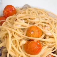 Spaghetti Pomodoro · San Marzano tomato, garlic, basil, Parmigiano.
