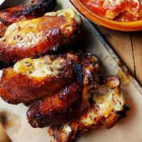 Wood Fired Rosemary Wings 16 Pcs · Blue Cheese Dipping Sauce