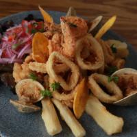 Jaleita · Catch of the day - lightly fried seafood - cassava - salsa criolla.