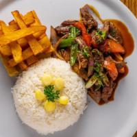 Lomo Saltado · Gluten Free. Stir fry steak - onions - tomatoes - tamari soy sauce - hand cut fries - rice.