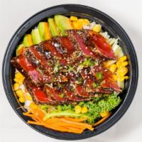 Peppered Tuna Bowl · Peppered tuna, avocado, cucumber, mango, and eel sauce. Served with sushi rice.