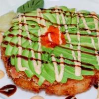 Crispy Sushi Pizza · Deep fried sushi rice, topped spicy salmon or spicy tuna, avocado sweet, and spicy sauce.