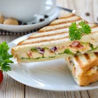 Ranchero Panini · Delicious Panini made with Chipotle chicken, bacon, American cheese and ranch dressing. Serv...