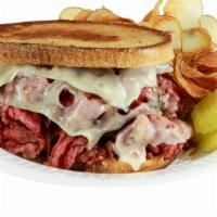 City Pastrami Sandwich W/ French Fries · Marble Rye bread toast grilled with pastrami, Sauteed onions , Swiss cheese and a squeeze of...