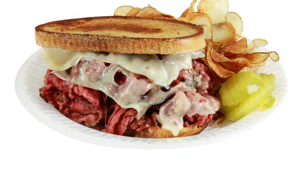 City Pastrami Sandwich W/ French Fries · Marble Rye bread toast grilled with pastrami, Sauteed onions , Swiss cheese and a squeeze of deli mustard