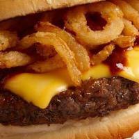 Western Bbq Burger W/ French Fries · Topped with onion rings, BBQ sauce, extra sharp cheddar and bacon.
