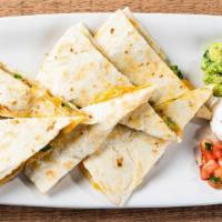 Veggie Quesadillas (Vegetarian) · Zucchini, squash & bell peppers and roasted red chile tomatillo salsa. Served with fresh gua...