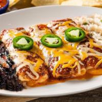 Tres Cheese Enchiladas (Vegetarian) · Three cheese enchiladas topped with roasted red chile tomatillo salsa. Served with cilantro ...