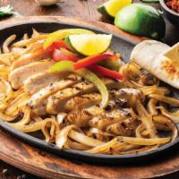 Classic Fajitas · Our famous fajitas are grilled over mesquite wood and served with hand-pressed flour tortill...