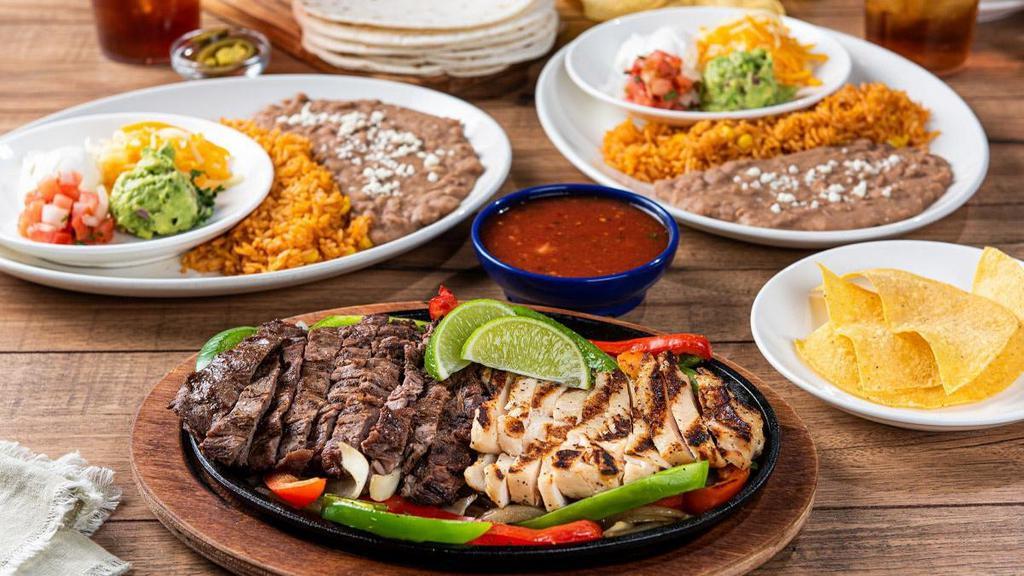 Classic Fajitas For Two · Choose any two Classic Fajita styles. Served with hand-pressed flour tortillas, pico de gallo, cheese, Mexican rice and choice of beans.