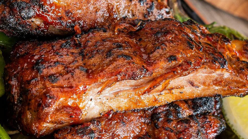 Add Chipotle Ribs · Three ribs served with honey chipotle sauce.