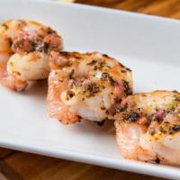 Add Shrimp Skewer  · A skewer with three mesquite-grilled shrimp brushed with lime cilantro chimichurri.