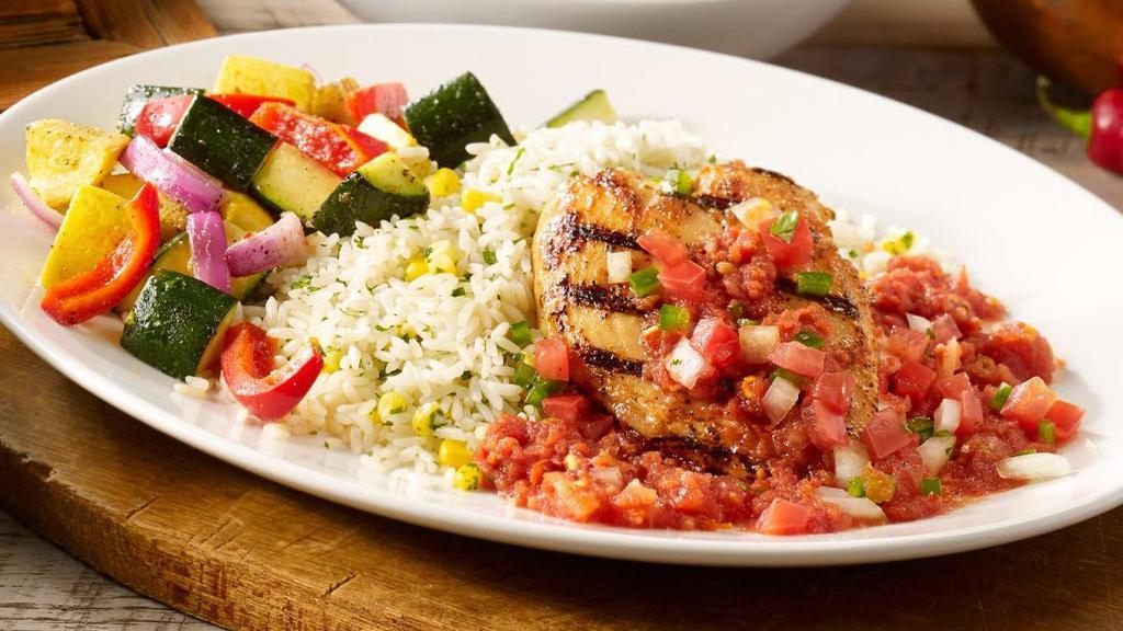 Mexican Grilled Chicken · Mesquite-grilled chicken breast topped with salsa and pico de gallo. Served with sautéed vegetables and cilantro lime rice.