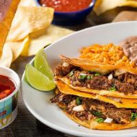 Birria Quesa Tacos · Beef barbacoa, Mexican cheese, diced onion and cilantro in crispy flour tortillas. Served wi...