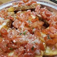 Bruschetta · Diced Roma tomatoes and red onions seasoned with herbs and spices served on toasted semolina...