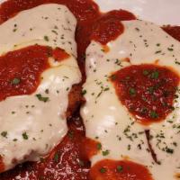 Chicken Parmigiana  · Tomato sauce and melted mozzarella.